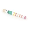 Flûte rayée multicolore en bois